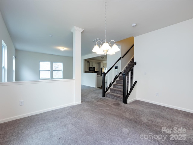 unfurnished living room with baseboards, stairway, an inviting chandelier, and carpet
