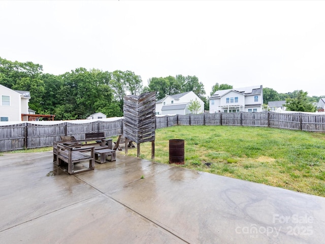 view of patio with a fenced backyard