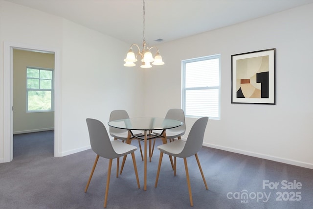 1523 Loropetalum Rd, Charlotte, NC 28215 - dining room featuring dark colored carpet, baseboards, a chandelier, and visible vents
