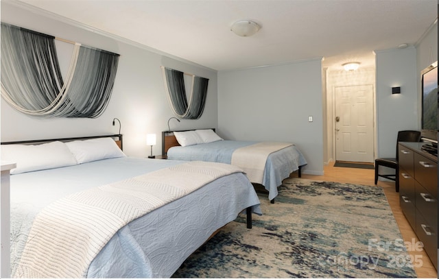160 Whitney Blvd, Lake Lure, NC 28746 - bedroom featuring ornamental molding and light wood-type flooring