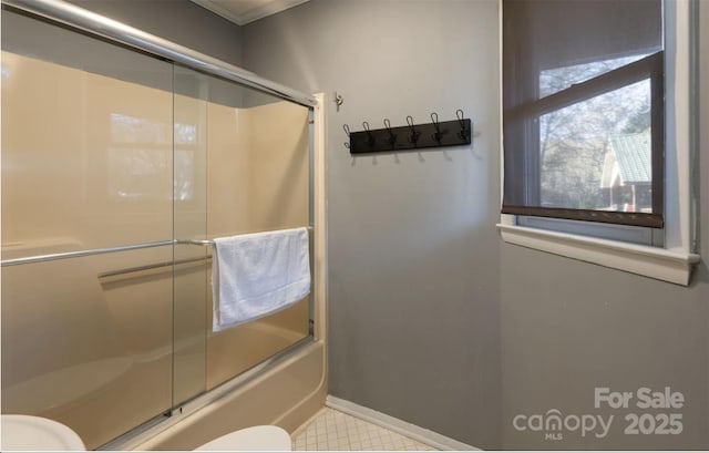 160 Whitney Blvd, Lake Lure, NC 28746 - bathroom featuring toilet, baseboards, and combined bath / shower with glass door