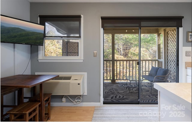 160 Whitney Blvd, Lake Lure, NC 28746 - doorway with baseboards and wood finished floors