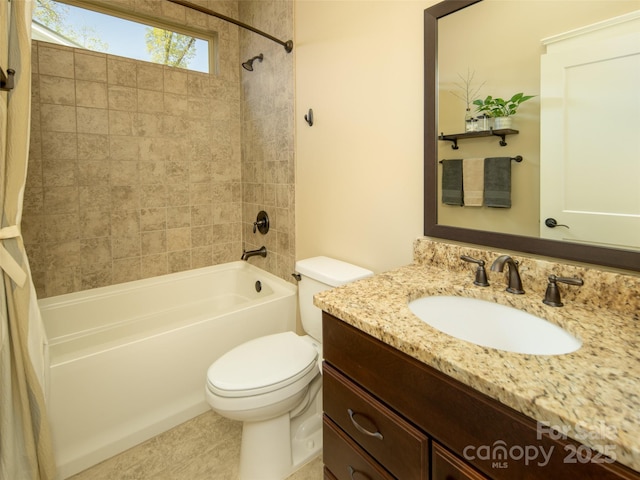 bathroom with shower / bath combination, vanity, and toilet
