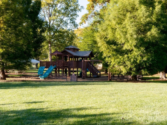 community playground featuring a yard