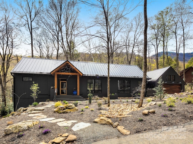 80 Hemlock Cir, Black Mountain, NC 28711 - view of front of house with metal roof and a mountain view