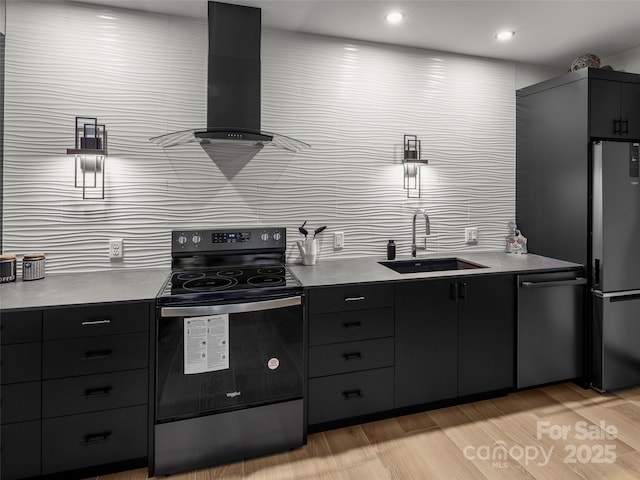 80 Hemlock Cir, Black Mountain, NC 28711 - kitchen with range with electric stovetop, a sink, stainless steel dishwasher, freestanding refrigerator, and dark cabinetry
