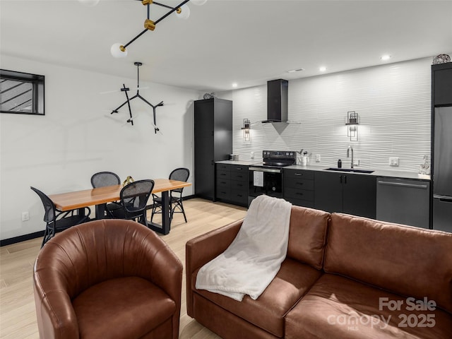 80 Hemlock Cir, Black Mountain, NC 28711 - living room featuring light wood-style floors, recessed lighting, and baseboards