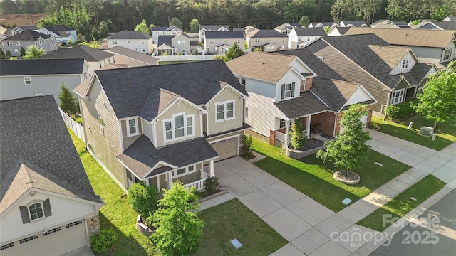 drone / aerial view featuring a residential view