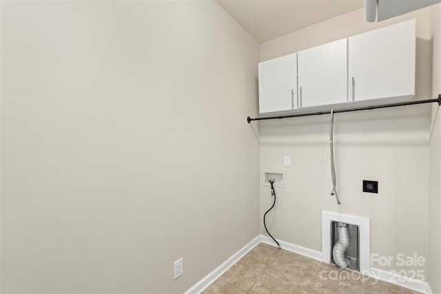 washroom featuring electric dryer hookup, baseboards, cabinet space, and hookup for a washing machine