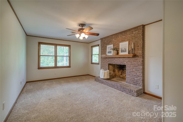 unfurnished living room with crown molding, ceiling fan, and carpet