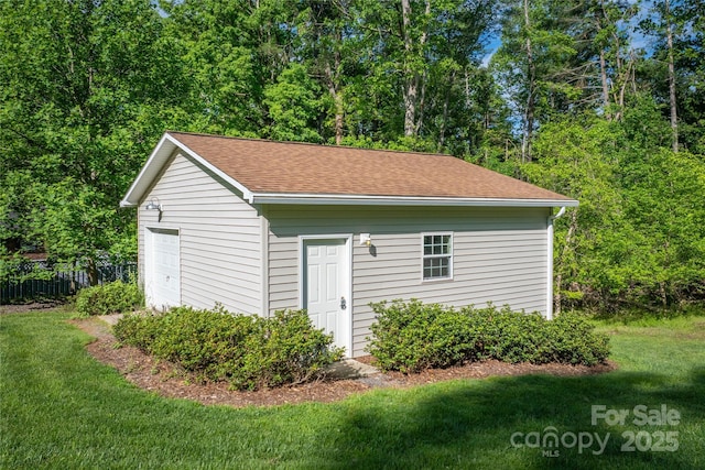 detached garage with fence