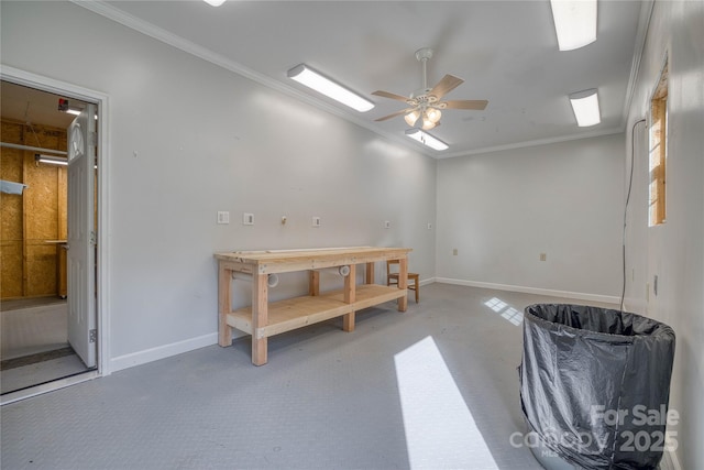 misc room with carpet floors, a ceiling fan, baseboards, and crown molding