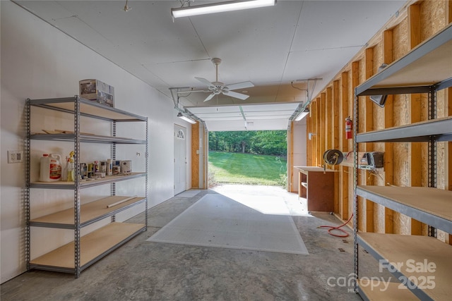 garage with a ceiling fan
