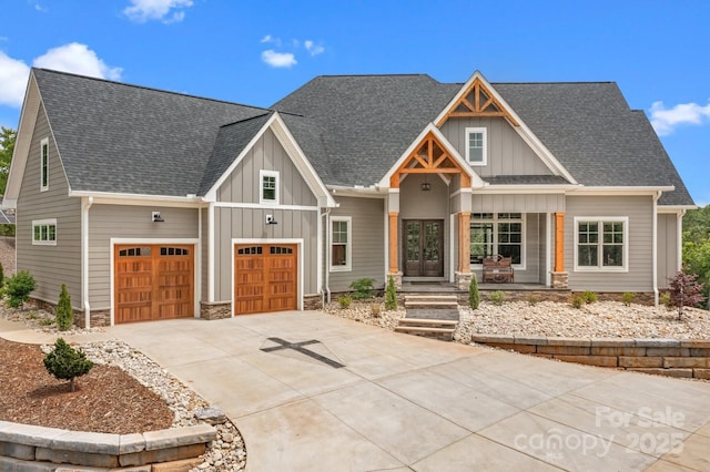 5360 Low Country Rd, Lenoir, NC 28645 - craftsman inspired home with board and batten siding, french doors, concrete driveway, stone siding, and a shingled roof