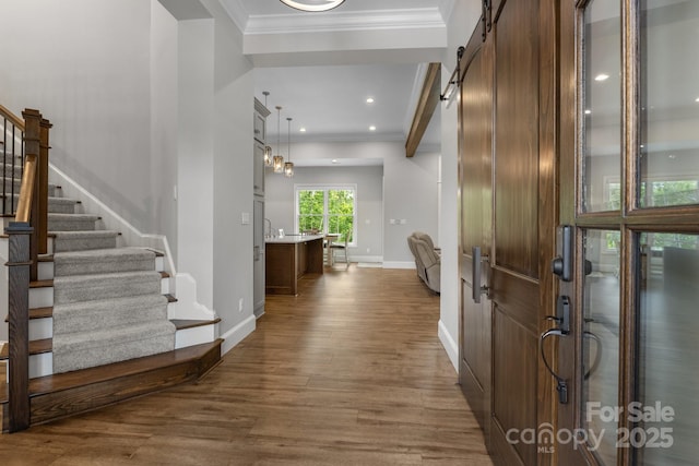 5360 Low Country Rd, Lenoir, NC 28645 - entryway with baseboards, dark wood-style flooring, crown molding, stairway, and a barn door