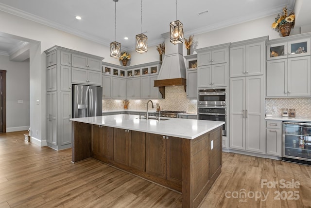 5360 Low Country Rd, Lenoir, NC 28645 - kitchen with stainless steel appliances, wine cooler, a sink, gray cabinetry, and light countertops