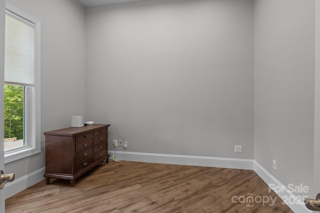 5360 Low Country Rd, Lenoir, NC 28645 - unfurnished room featuring wood finished floors and baseboards