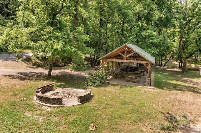 5360 Low Country Rd, Lenoir, NC 28645 - view of green lawn featuring a gazebo, an outdoor fire pit, and a wooded view