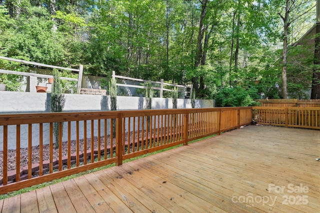 deck featuring fence private yard