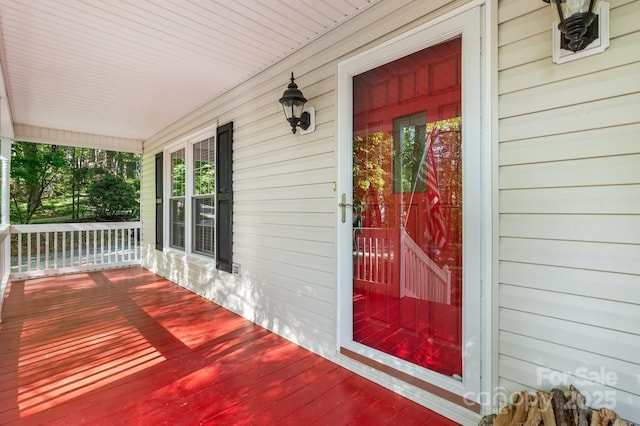 entrance to property featuring covered porch