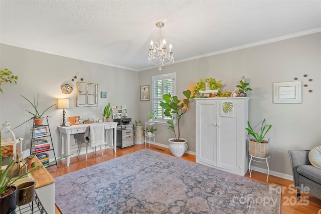 530 Bonita Dr, Landis, NC 28088 - office space featuring a chandelier, wood finished floors, ornamental molding, and baseboards