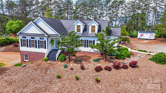 5562 Jenkins Rd, Morganton, NC 28655 - view of front of home with stairway and roof with shingles