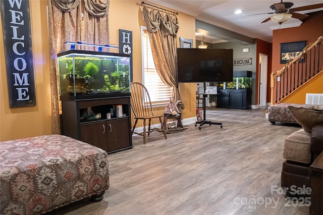 5562 Jenkins Rd, Morganton, NC 28655 - interior space featuring baseboards, ceiling fan, visible vents, wood finished floors, and stairway