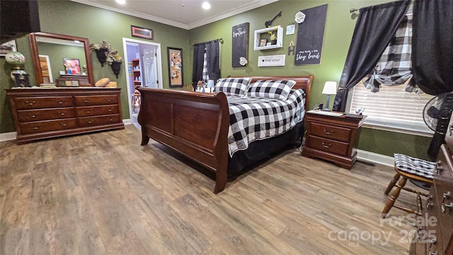 5562 Jenkins Rd, Morganton, NC 28655 - bedroom featuring crown molding, wood finished floors, baseboards, and recessed lighting