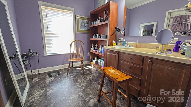 5562 Jenkins Rd, Morganton, NC 28655 - bathroom with baseboards, vanity, and crown molding