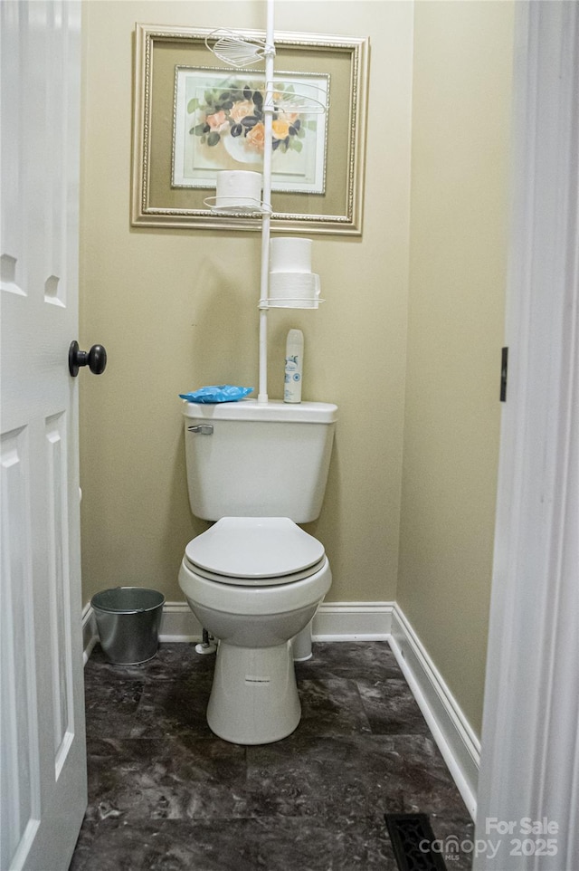 5562 Jenkins Rd, Morganton, NC 28655 - bathroom featuring toilet and baseboards
