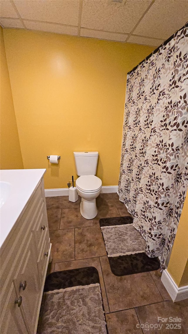 5562 Jenkins Rd, Morganton, NC 28655 - full bath featuring a paneled ceiling, baseboards, and toilet