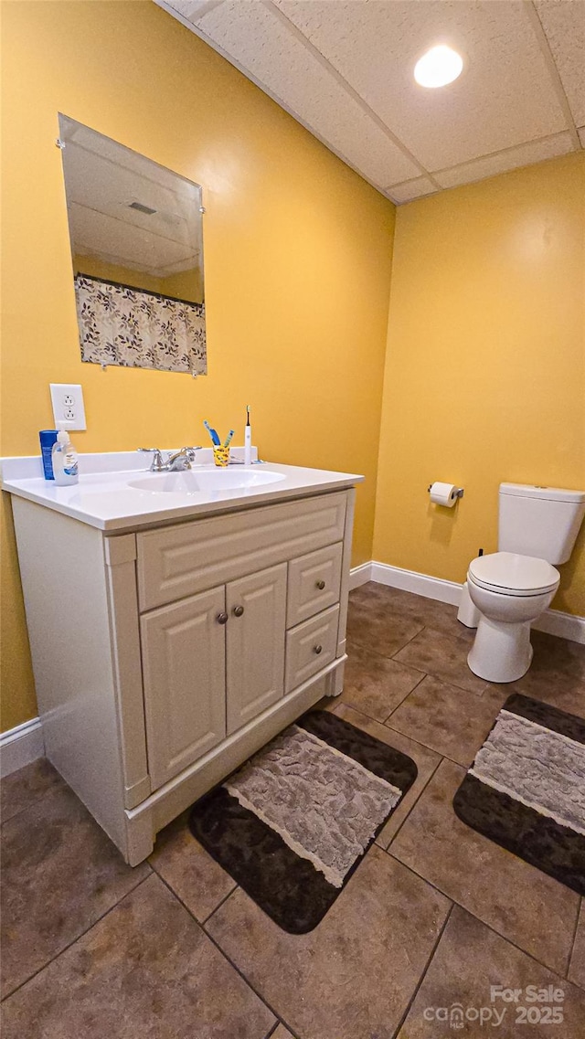 5562 Jenkins Rd, Morganton, NC 28655 - bathroom with toilet, vanity, tile patterned flooring, a shower with shower curtain, and baseboards