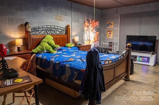 5562 Jenkins Rd, Morganton, NC 28655 - bedroom featuring concrete floors and concrete block wall