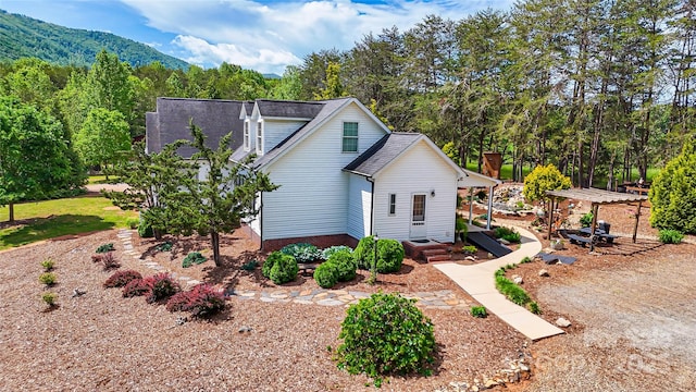 5562 Jenkins Rd, Morganton, NC 28655 - view of side of property featuring a pergola and a mountain view