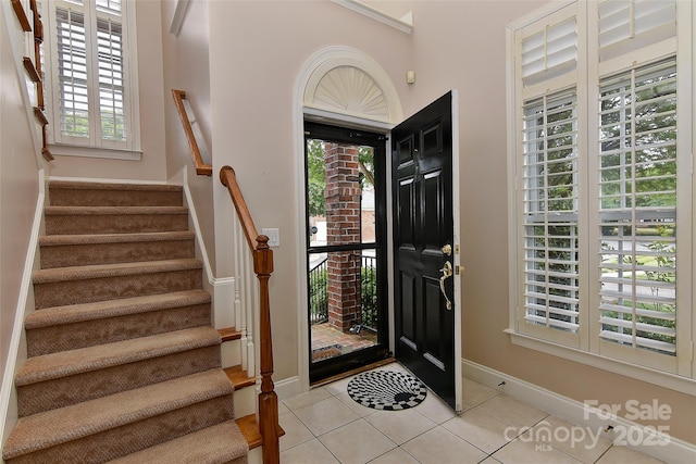 1142 Ardwyck Pl Unit 5, Rock Hill, SC 29730 - foyer entrance with plenty of natural light, light tile patterned floors, stairs, and baseboards