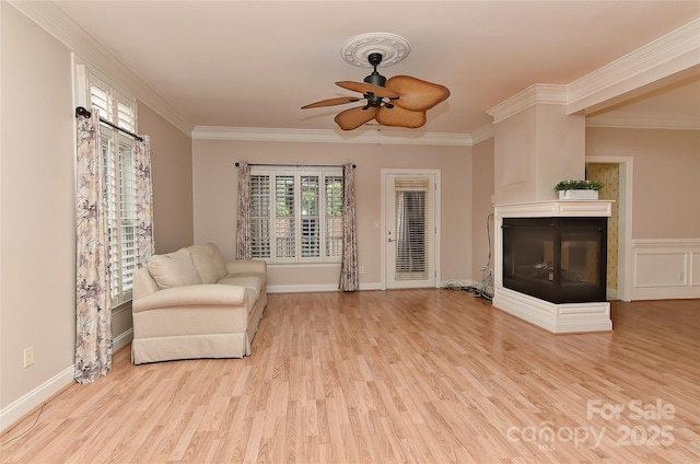 1142 Ardwyck Pl Unit 5, Rock Hill, SC 29730 - sitting room with crown molding, a ceiling fan, light wood-style floors, a multi sided fireplace, and baseboards