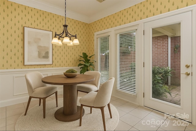1142 Ardwyck Pl Unit 5, Rock Hill, SC 29730 - dining space featuring wallpapered walls, light tile patterned flooring, a chandelier, a wainscoted wall, and crown molding