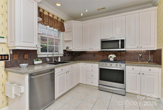 1142 Ardwyck Pl Unit 5, Rock Hill, SC 29730 - kitchen featuring stainless steel appliances, a sink, crown molding, white cabinets, and light tile patterned floors