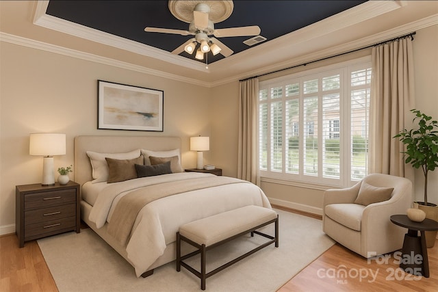 1142 Ardwyck Pl Unit 5, Rock Hill, SC 29730 - bedroom with a raised ceiling, light wood-style flooring, and ornamental molding