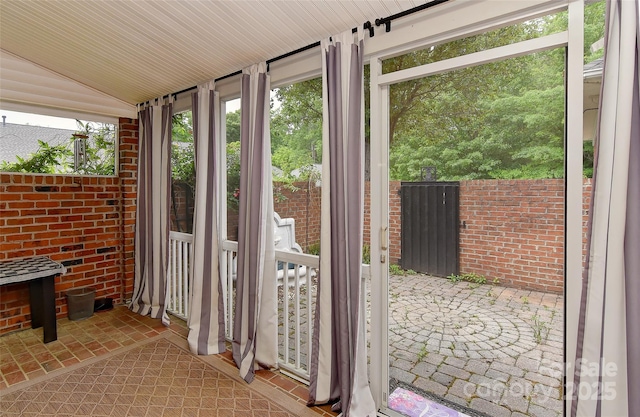 1142 Ardwyck Pl Unit 5, Rock Hill, SC 29730 - doorway featuring lofted ceiling and brick wall