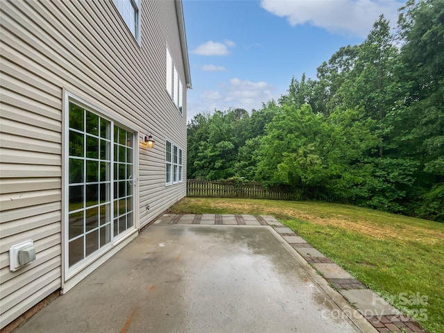 view of patio with fence