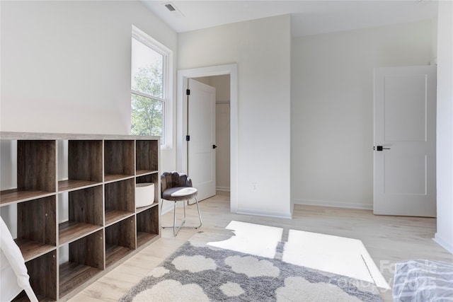 3300 Travis Ln NW, Concord, NC 28027 - bedroom featuring visible vents, baseboards, and light wood-type flooring