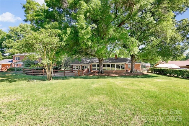 view of yard with fence