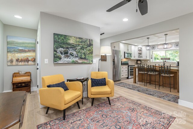 4329 Island Ford Rd, Brevard, NC 28712 - sitting room featuring ceiling fan, light wood-type flooring, recessed lighting, and baseboards