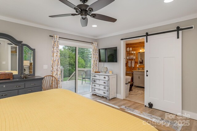 4329 Island Ford Rd, Brevard, NC 28712 - bedroom featuring access to outside, light wood finished floors, a barn door, recessed lighting, and connected bathroom