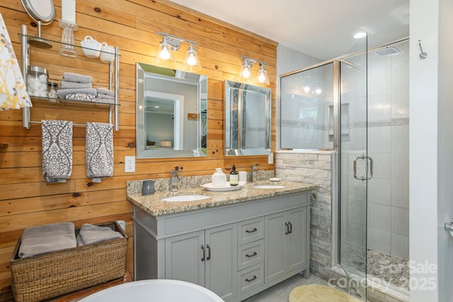 4329 Island Ford Rd, Brevard, NC 28712 - full bath featuring a stall shower, double vanity, wood walls, tile patterned floors, and a soaking tub