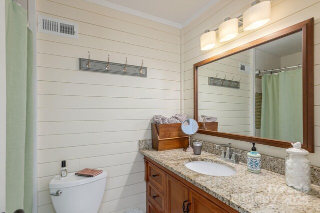 4329 Island Ford Rd, Brevard, NC 28712 - bathroom with wooden walls, vanity, toilet, and a shower with shower curtain
