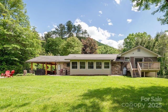 4329 Island Ford Rd, Brevard, NC 28712 - rear view of property featuring a deck and a yard