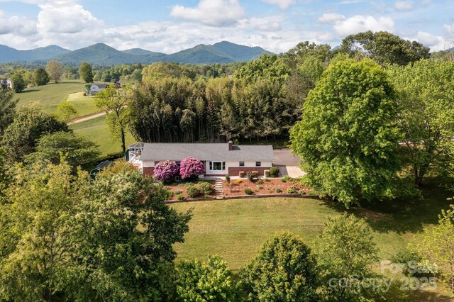 1572 Alexander Rd, Leicester, NC 28748 - view of subject property featuring a mountainous background and a heavily wooded area