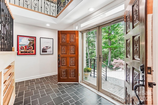 115 Forestcliff Ct NE, Concord, NC 28025 - entrance foyer featuring baseboards, recessed lighting, and a high ceiling